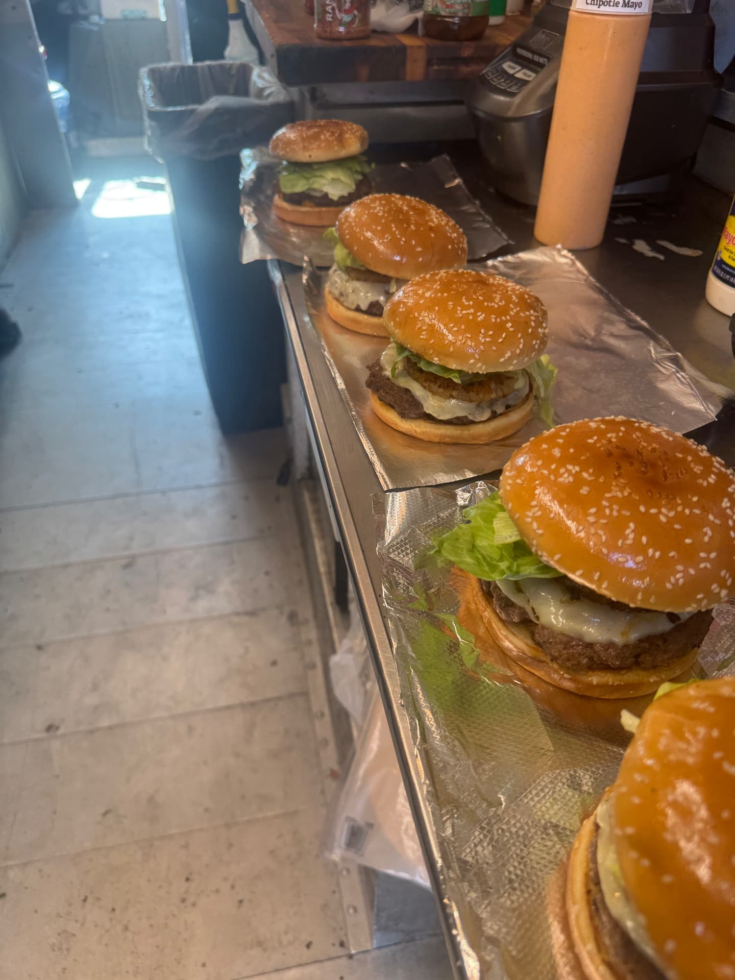 Fresh burgers on the truck's prep line