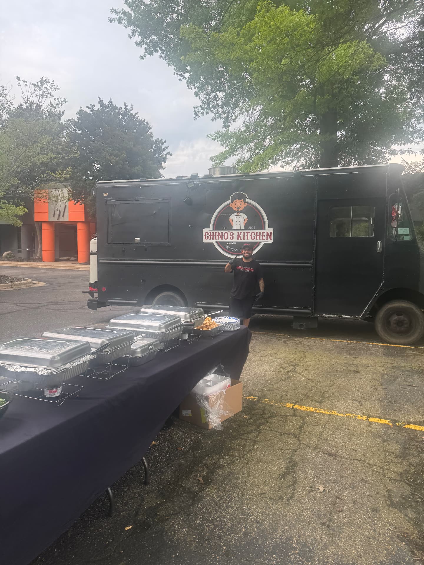 Chino's Kitchen food truck set up for a catered event